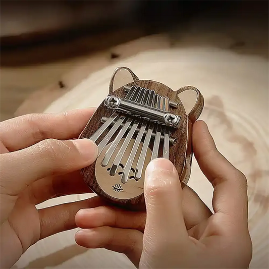 Playing the Kalimba: Fingertips or Nails?