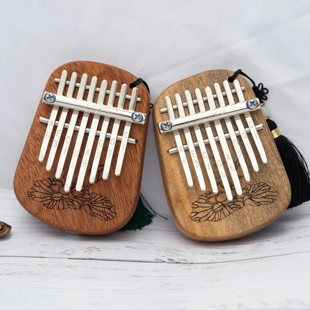 Side angle of an 8-key kalimba, showcasing keys.